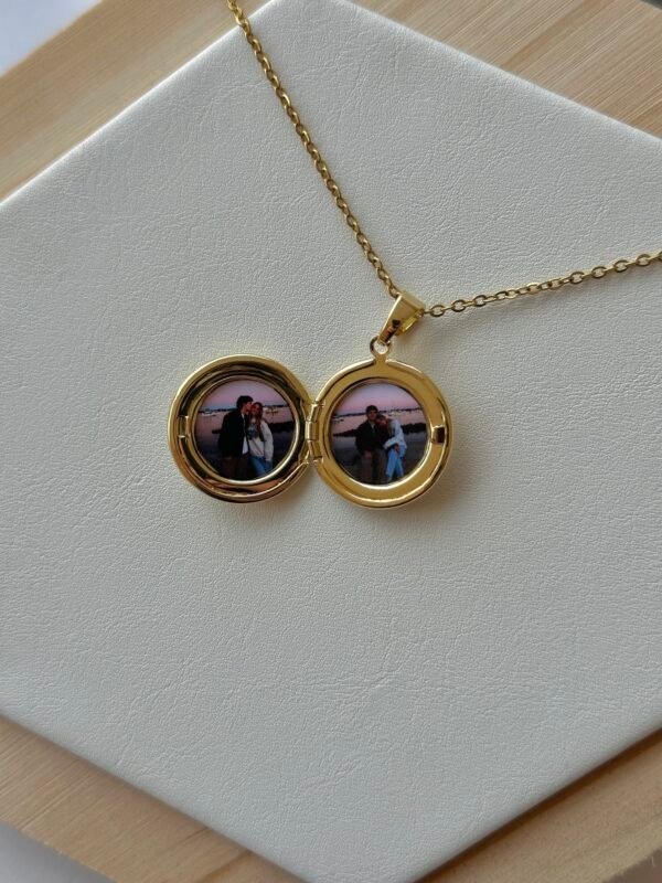 Relicario redondo dos corazones